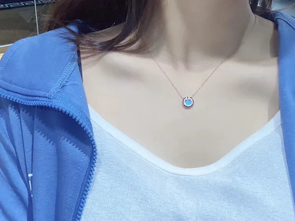 Tiffany & Co. Round T Inlay Pendant Necklace Rose-Tone with Blue Inlay product photo