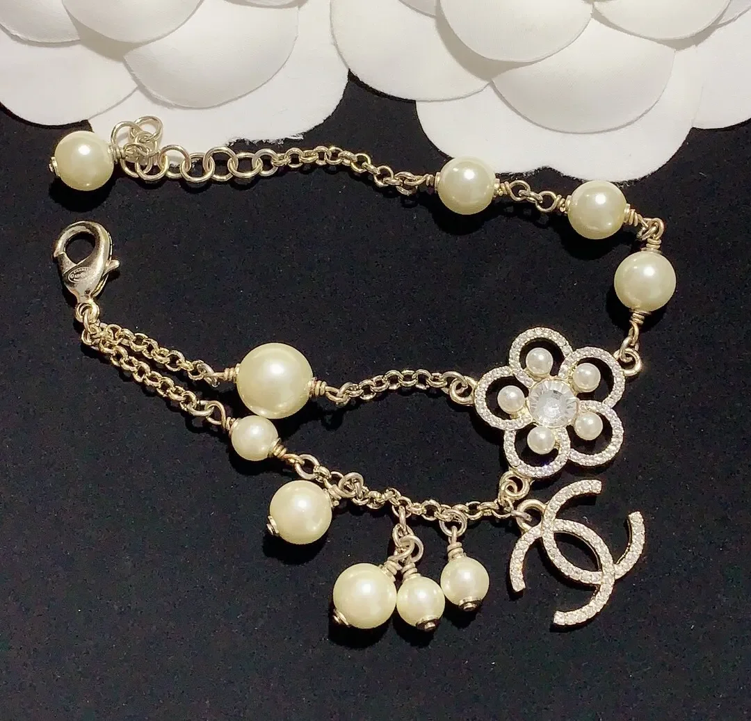 Chanel Flower CC Pearl-Effect Charm Bracelet Gold-Tone product view 1