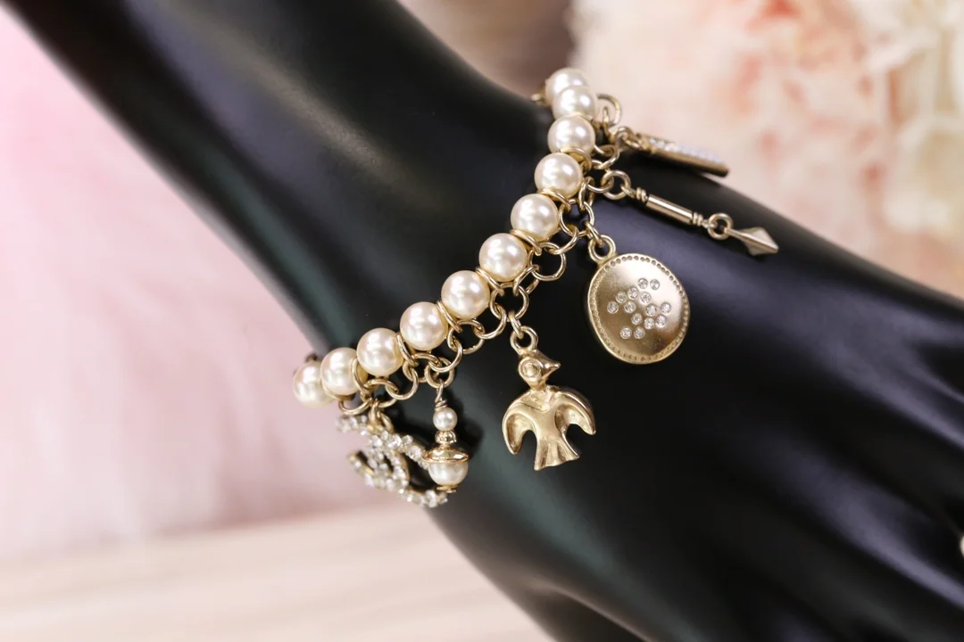 Chanel Bird CC Pearl-Effect Tassel Charm Bracelet Gold-Tone product view 3