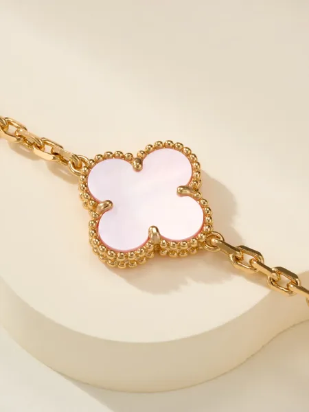 Van Cleef & Arpels Alhambra Pale Pink Clover and Gold-Tone Knot Bracelet product view 4