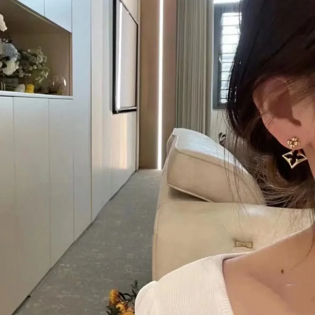 Louis Vuitton Asymmetric Hollow Blossom Earrings Gold-Tone product view 2