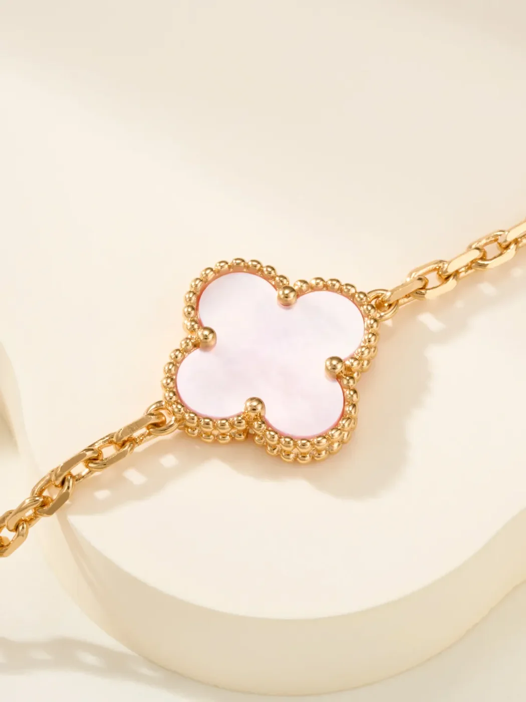 Van Cleef & Arpels Alhambra Pale Pink Clover and Gold-Tone Knot Bracelet product view 5