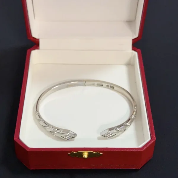 Cartier Silver-Tone Crossed Open Cuff with Pave-Effect Detail product view 4