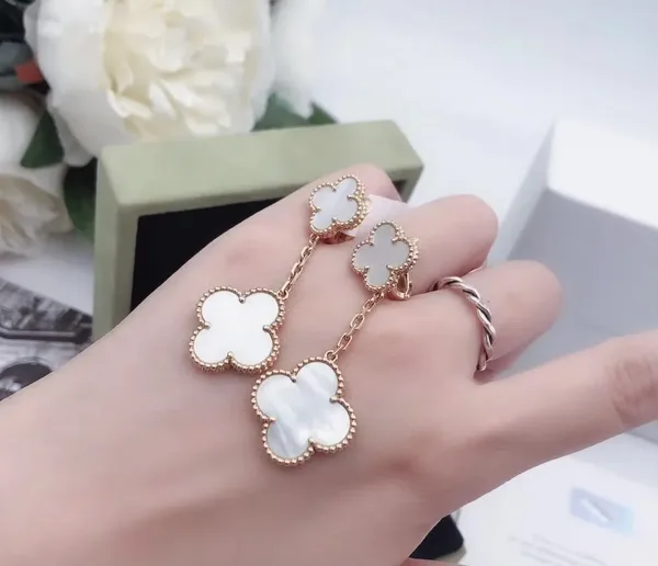 Van Cleef & Arpels Alhambra White Two-Motif Gold-Tone Drop Earrings product view 5