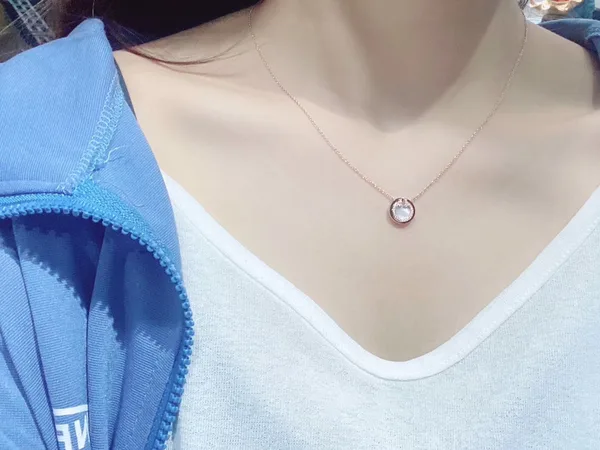 Tiffany & Co. Round T Inlay Pendant Necklace Rose-Tone with White Inlay product photo