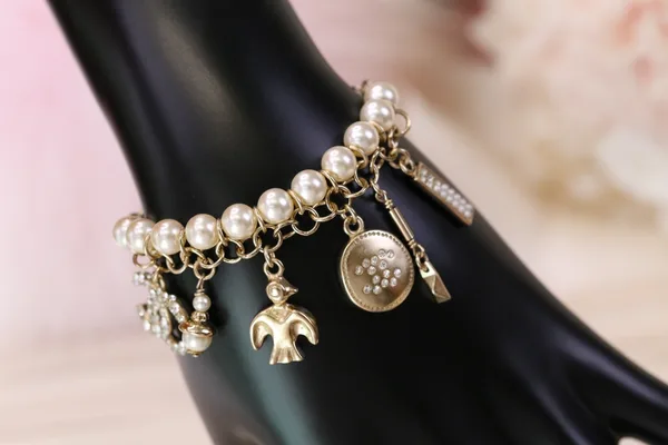 Chanel Bird CC Pearl-Effect Tassel Charm Bracelet Gold-Tone product photo
