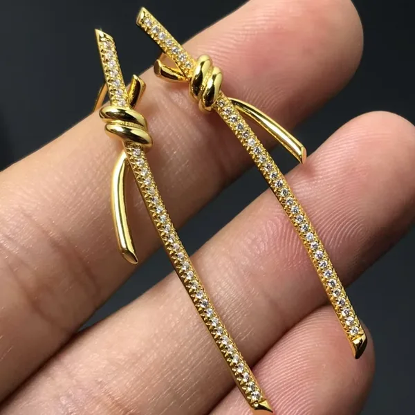 Tiffany & Co. Knot Long Drop Earrings Gold-Tone product photo