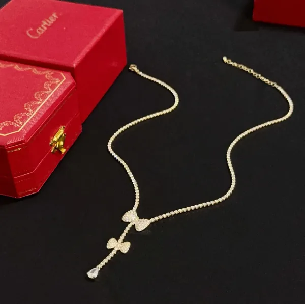 Cartier Gold-Tone Bow and Teardrop Pendant Necklace product view 6