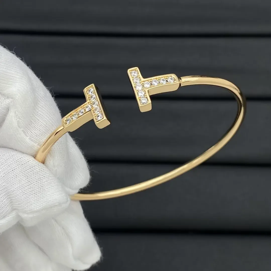 Tiffany & Co. Double T Narrow Round-Wire Pavé-Effect Cuff Gold-Tone product view 1