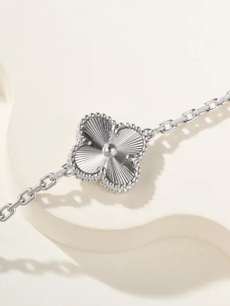 Van Cleef & Arpels Alhambra Blue Clover and Silver-Tone Knot Bracelet product view 8