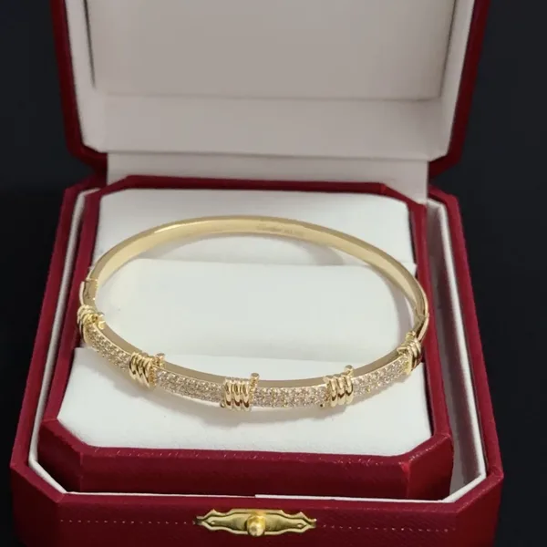 Cartier Gold-Tone Textured Bangle with Pave-Effect Details product view 3