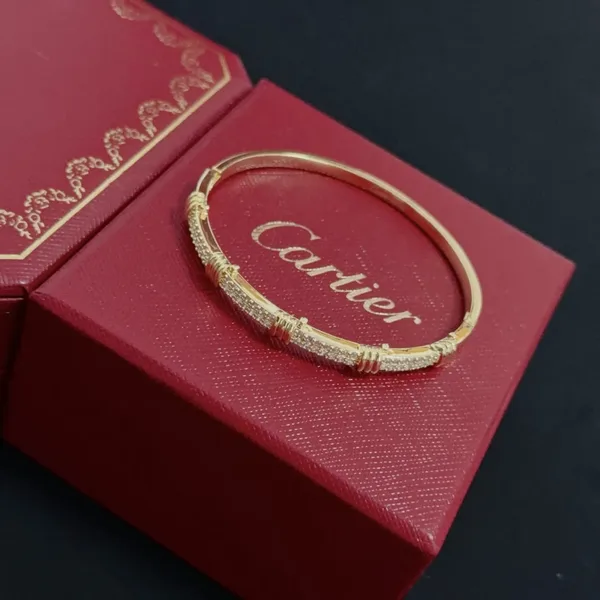 Cartier Gold-Tone Textured Bangle with Pave-Effect Details product view 6