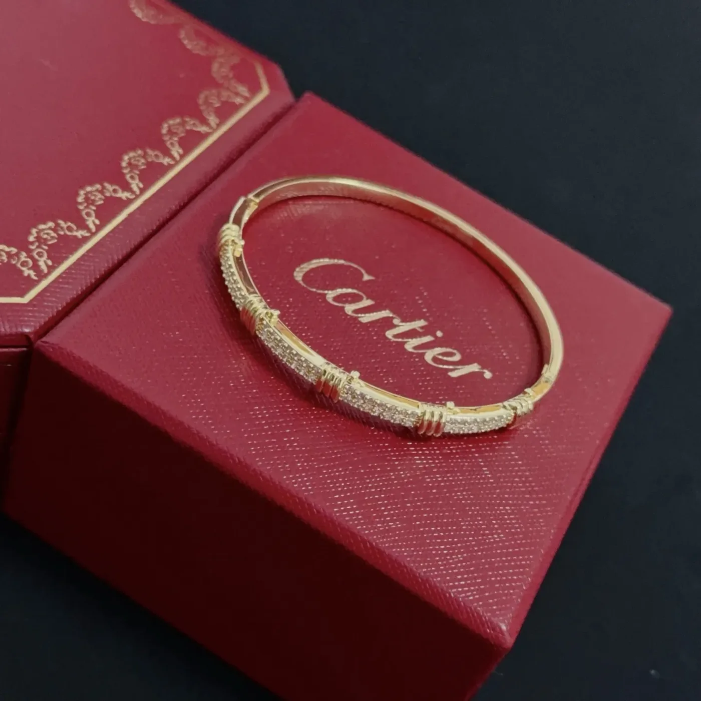 Cartier Gold-Tone Textured Bangle with Pave-Effect Details product view 6