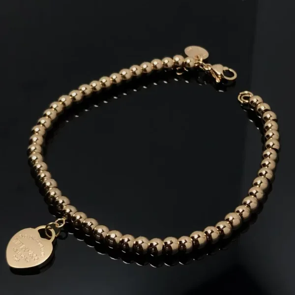 Tiffany & Co. Heart Tag Bead Bracelet Rose-Tone product photo