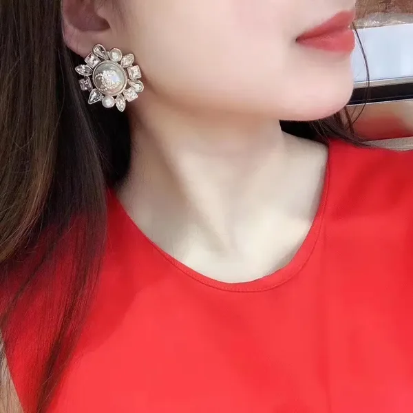 Chanel Pearl-Effect Floral Stud Earrings Gold-Tone product view 6