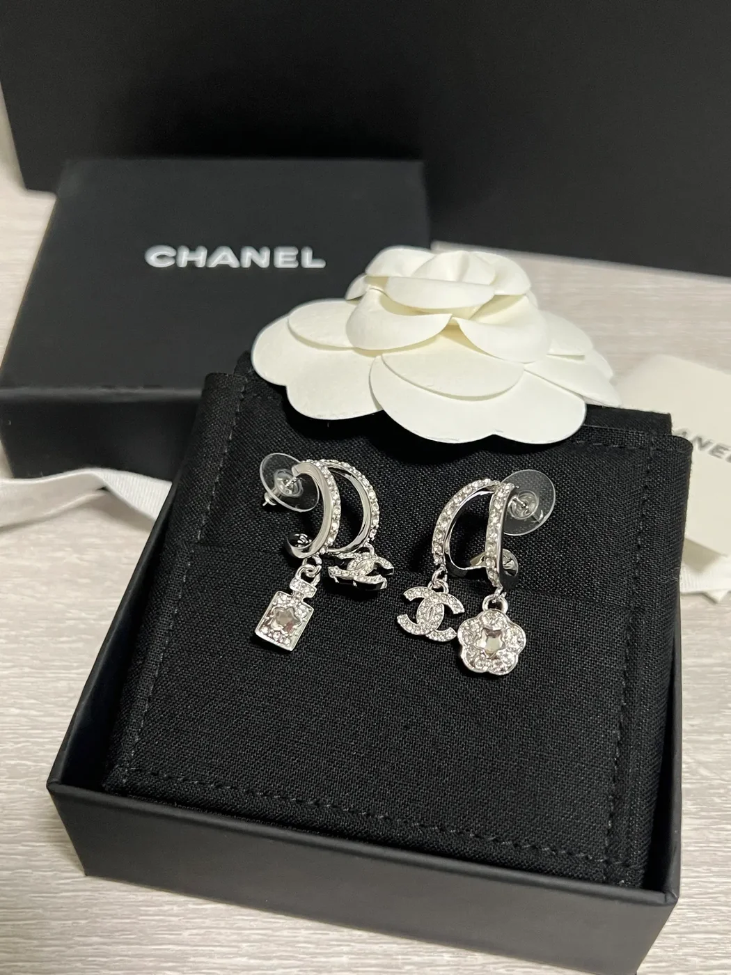Chanel Asymmetric Perfume Bottle and Camellia Charm Earrings Silver-Tone product view 1
