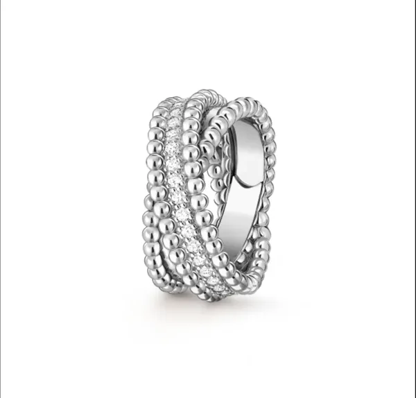 Van Cleef & Arpels Perlee Silver-Tone Beaded Ring with Pave-Effect Detail product photo