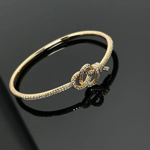 Tiffany & Co. Woven Knot Round Pavé-Effect Bangle Gold-Tone product photo