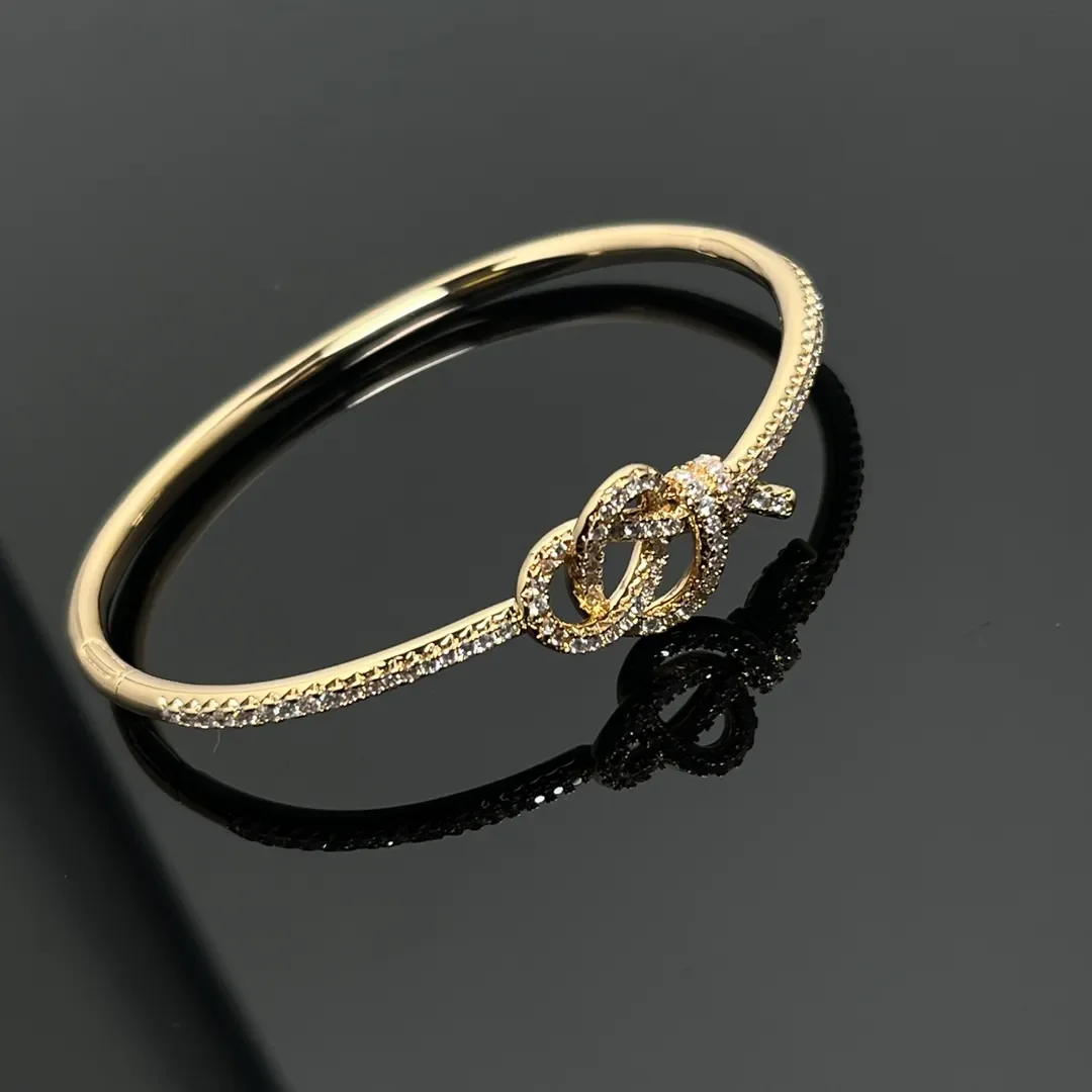 Tiffany & Co. Woven Knot Round Pavé-Effect Bangle Gold-Tone product view 1