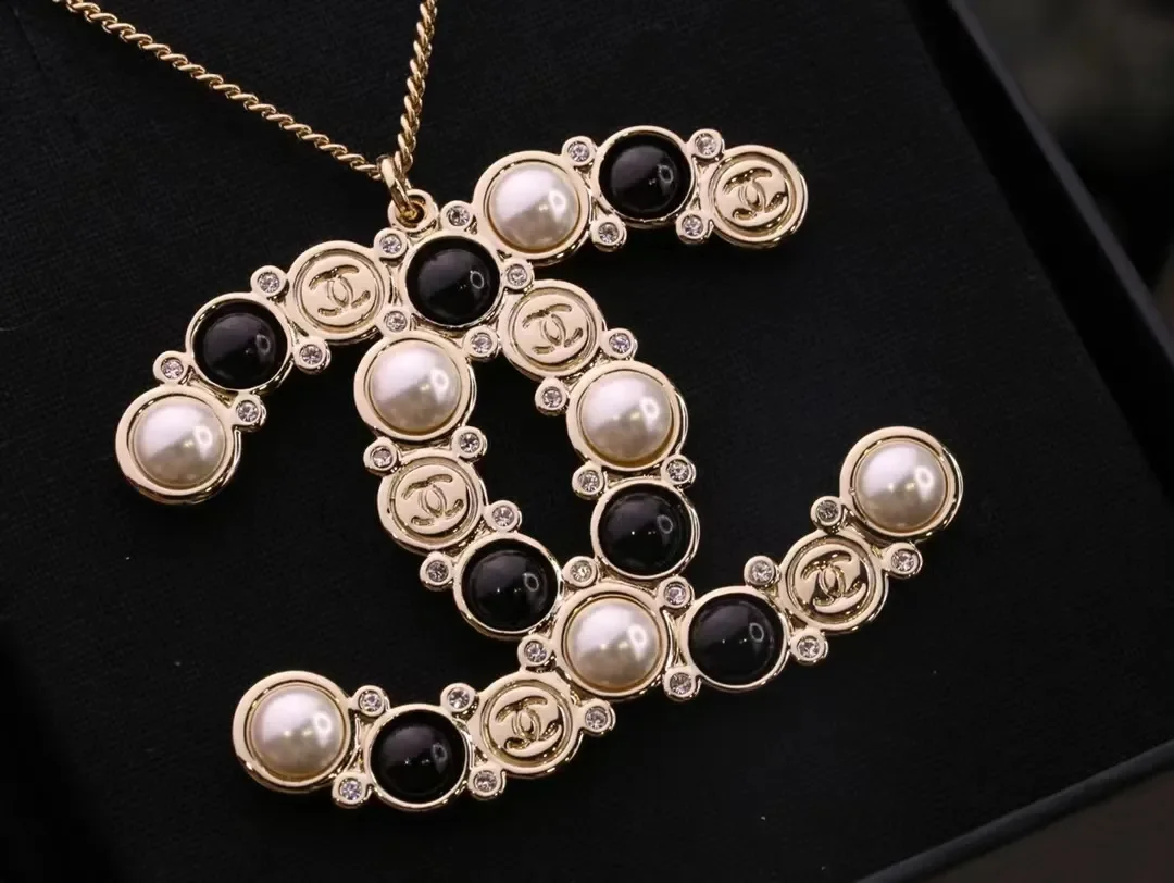 Chanel Oversized Pearl-Effect CC Pendant Necklace Black and Gold-Tone product view 4