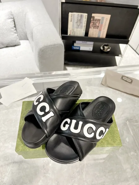 Gucci Cross-Strap Slide Sandals — Black with White Logo product photo