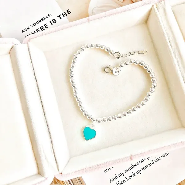Tiffany & Co. Blue Heart Tag Bead Bracelet Silver-Tone with Blue Inlay product photo